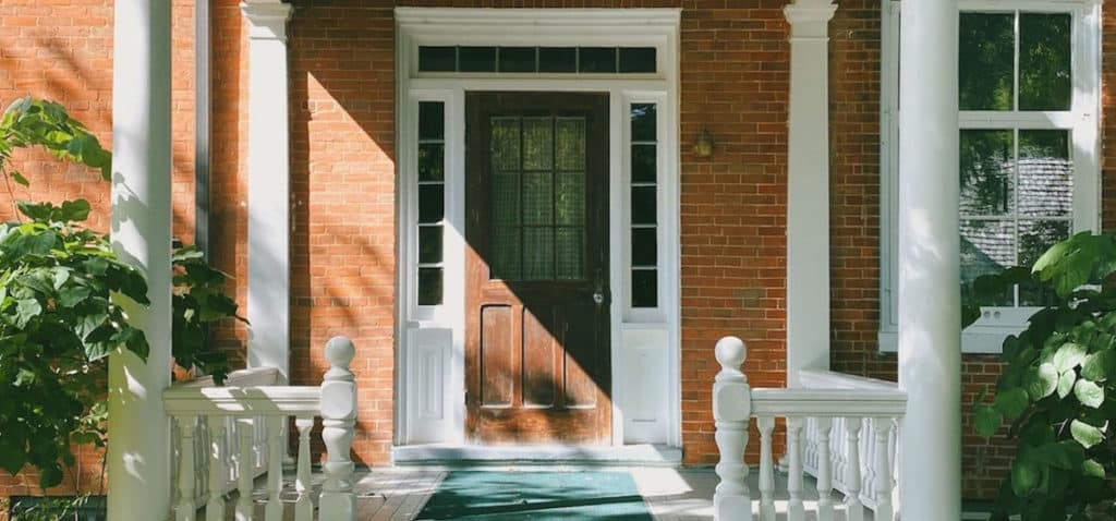 Front porch of an old brick home